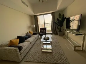 Own in Ajman, with a payment of 50,000 and a 7-year installment,